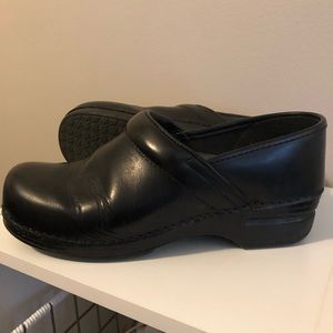 SOLD . Dansko Black Clogs